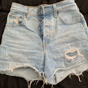 light blue levis ribcage shorts ripped
